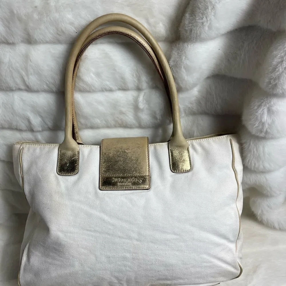 Vintage Kate spade beige canvas and faded gold trims shoulder bag.